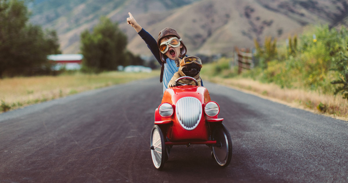 picture of a kid in a toy car