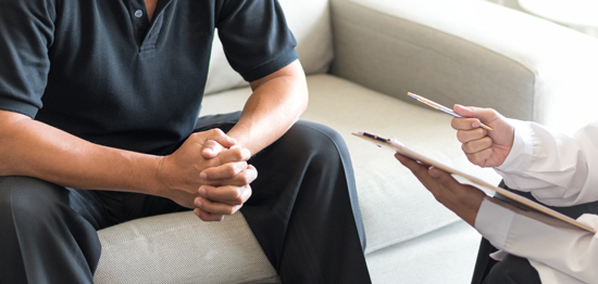 picture of a man consulting with his doctor