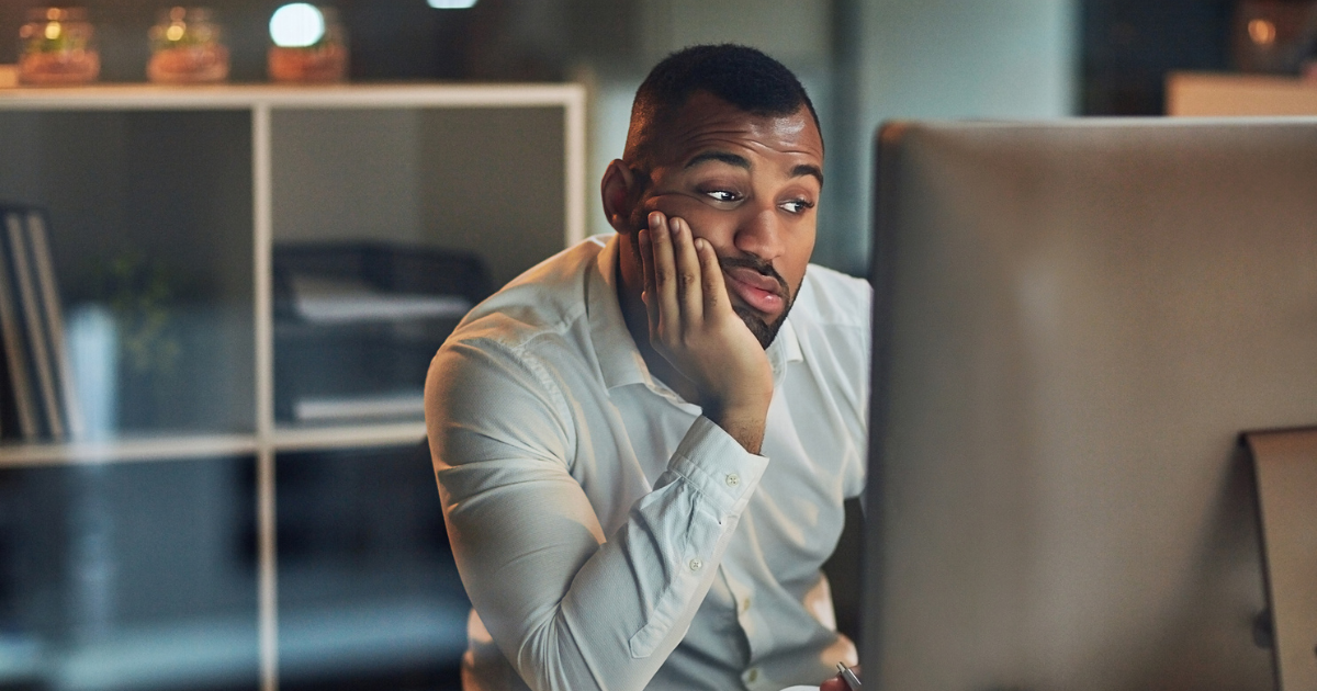 Man staring at a computer