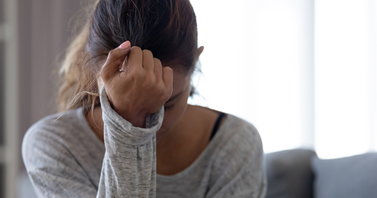 picture of a tired and anxious woman