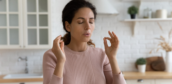 picture of a woman using breathing exercises