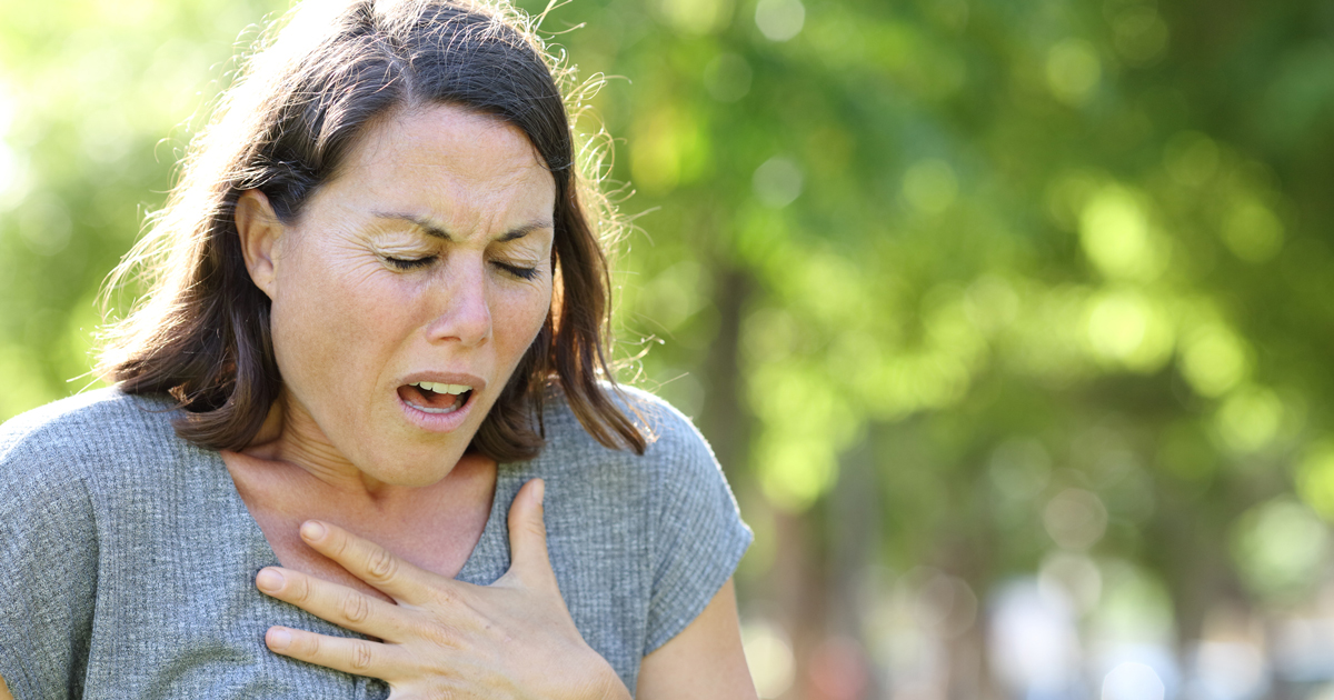 Picture of a woman clutching her chest