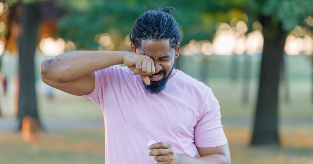 Man rubbing his eyes