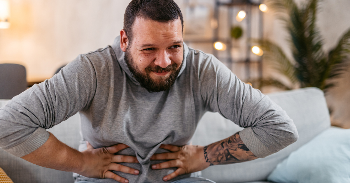 Man holding his stomach