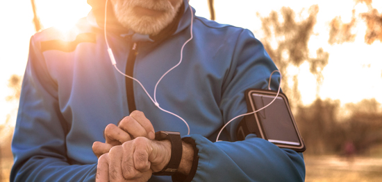 picture of a man checking his heart monitor