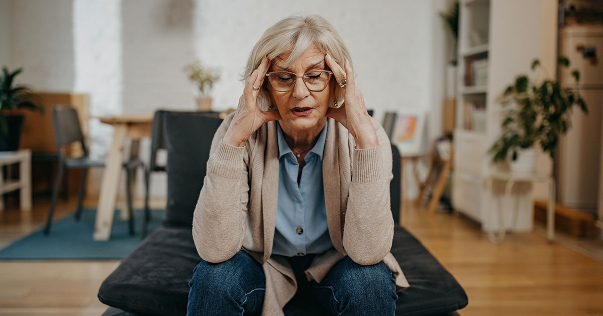 picture of a woman with a headache