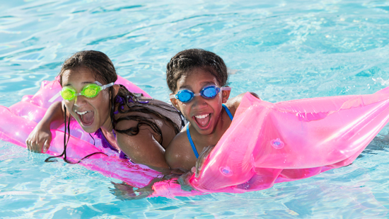 picture of girls playing in a pool