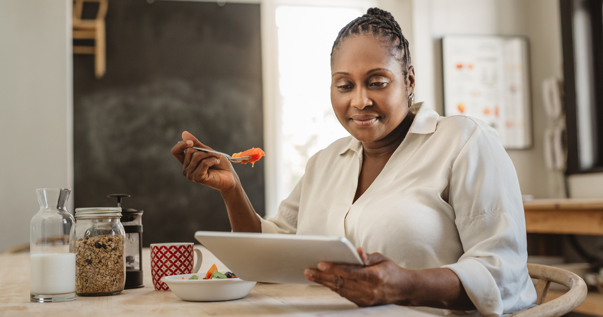 picture of a woman eating a meal