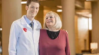 Cardiothoracic Surgeon David Berkheim, MD, left, with his patient, lung cancer survivor Kathy Watson.