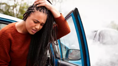 picture of a woman with her hand on her head