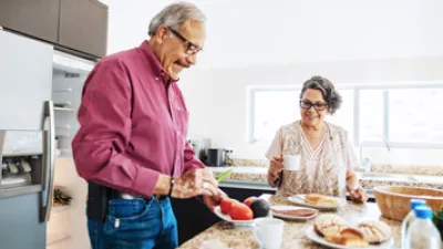 picture of a couple in the kitchen