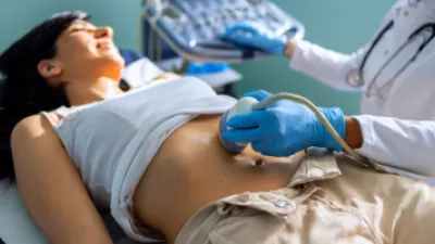 Woman receiving an ultrasound on her stomach