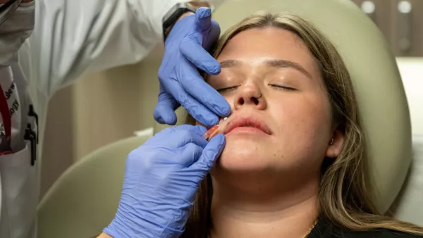 A picture of a woman receiving NovaThreads treatment