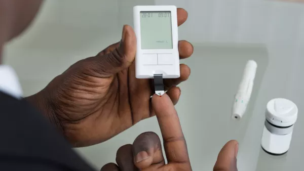 Man checking his blood sugar