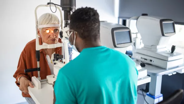 Woman getting an eye exam