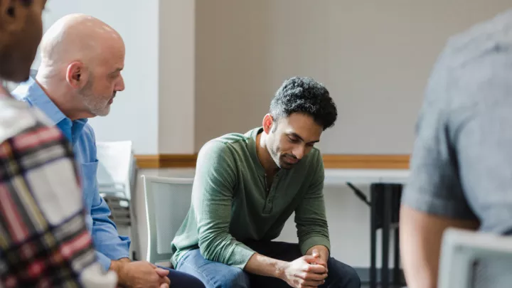 Picture of a man in group therapy