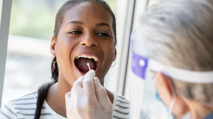 Woman getting DNA swab