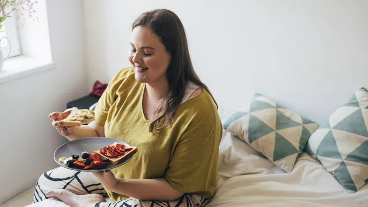 Picture of a woman eating a healthy meal