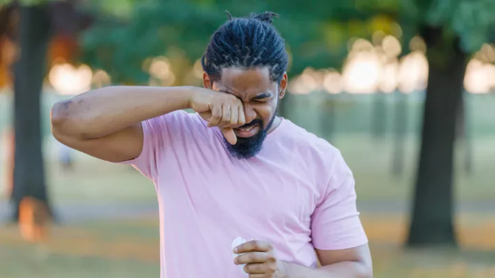 Man rubbing his eyes