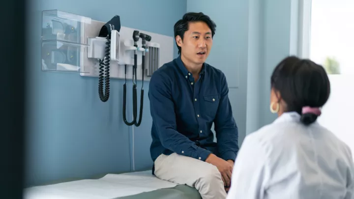 Picture of a man sitting in a doctor's office