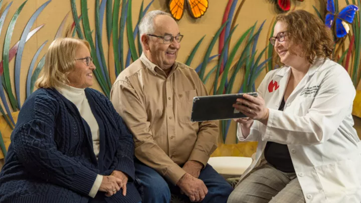 Martha Potts, clinical trial patient James Potts, and nurse coordinator Amanda Strain