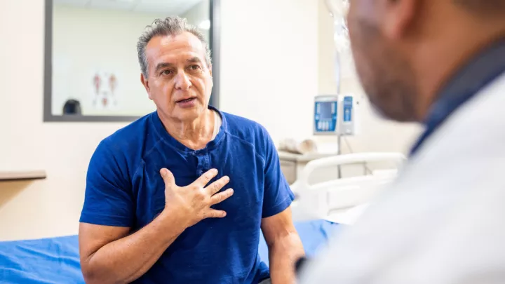 Man talking to his doctor