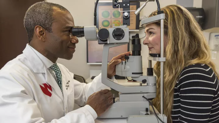 Woman receiving an eye exam