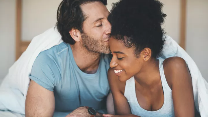 Man and woman in bed