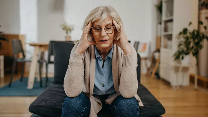 picture of a woman with a headache