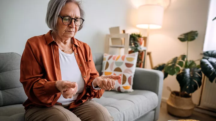 Woman looking at her fists