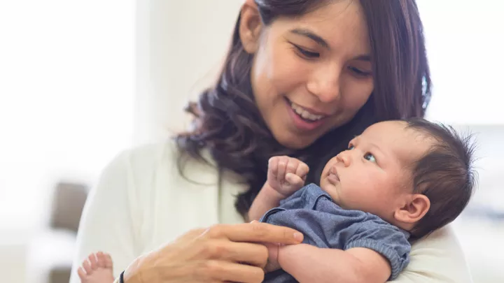 Woman holding her baby