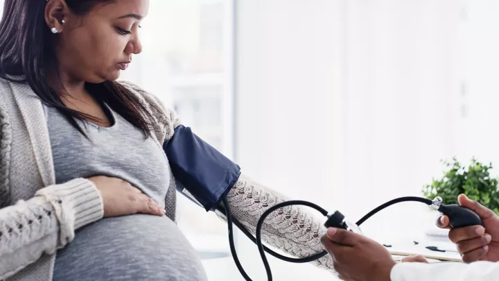 Woman getting blood pressure read
