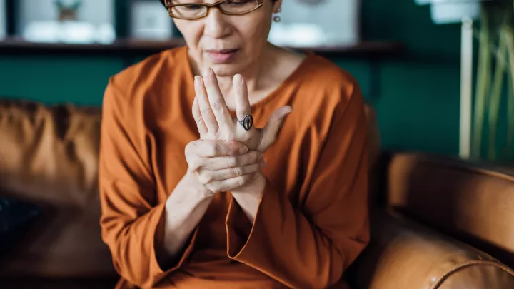 woman holding wrist