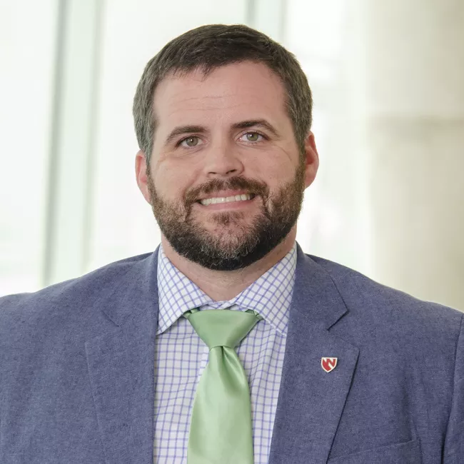 Thomas J Meredith, MD